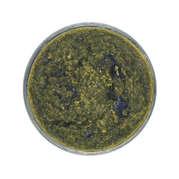 Back 2 Basics Antioxidant Blend in a small round container, featuring a coarsely-ground paste of kale, pumpkin, and blueberries, ideal as a pet meal topper.