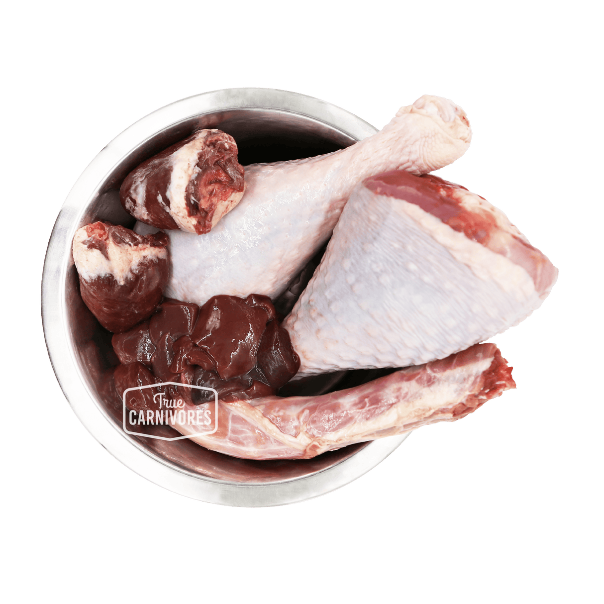 Stainless-steel bowl with turkey drumsticks, neck, and giblets, featuring the True Carnivores logo; 100 Mile Raw Just Turkey, a locally sourced, single-protein pet food.