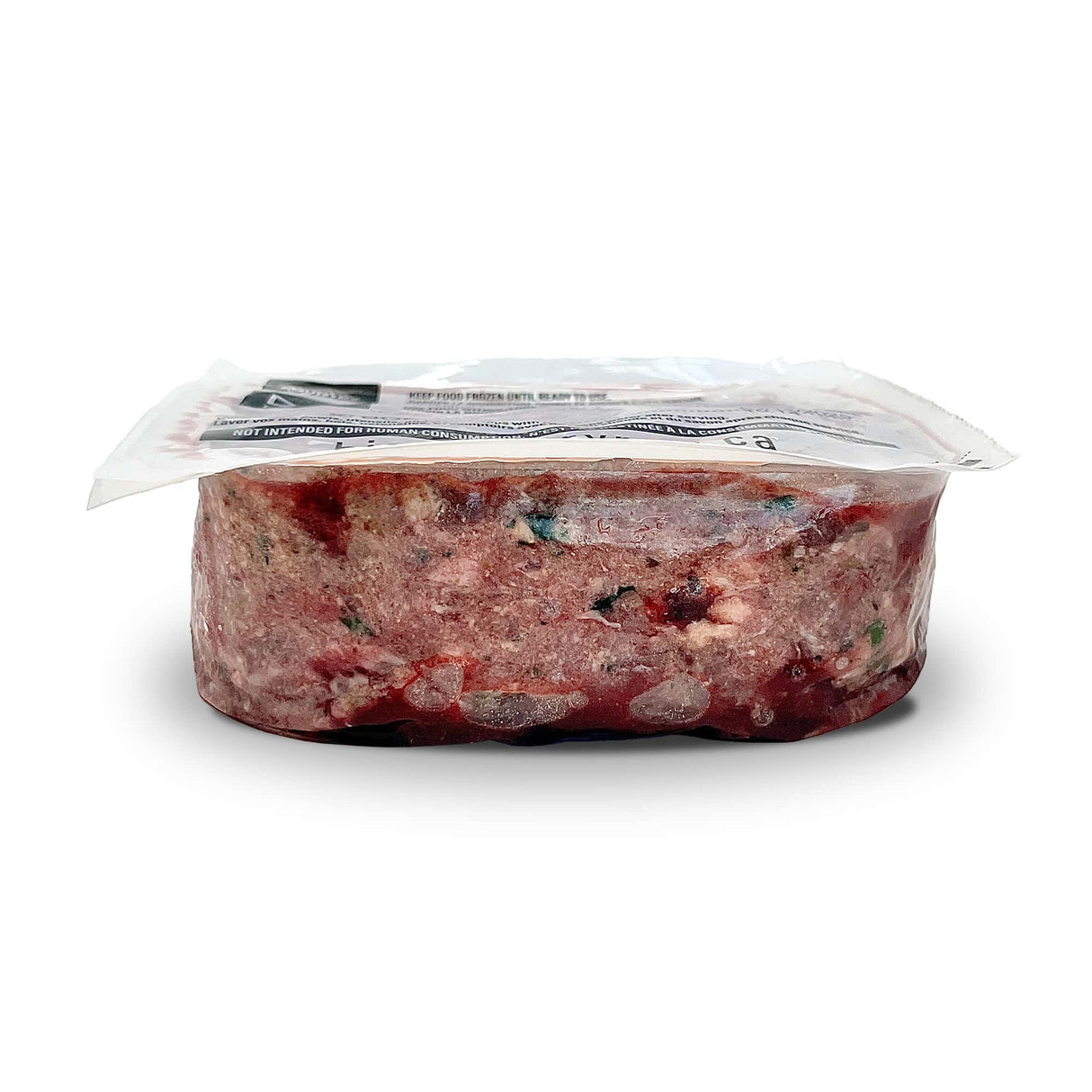 Big Country Raw XL Beef, vacuum-sealed frozen block of coarsely ground beef and pork, labeled Not intended for human consumption, designed for large dogs' nutritional needs.