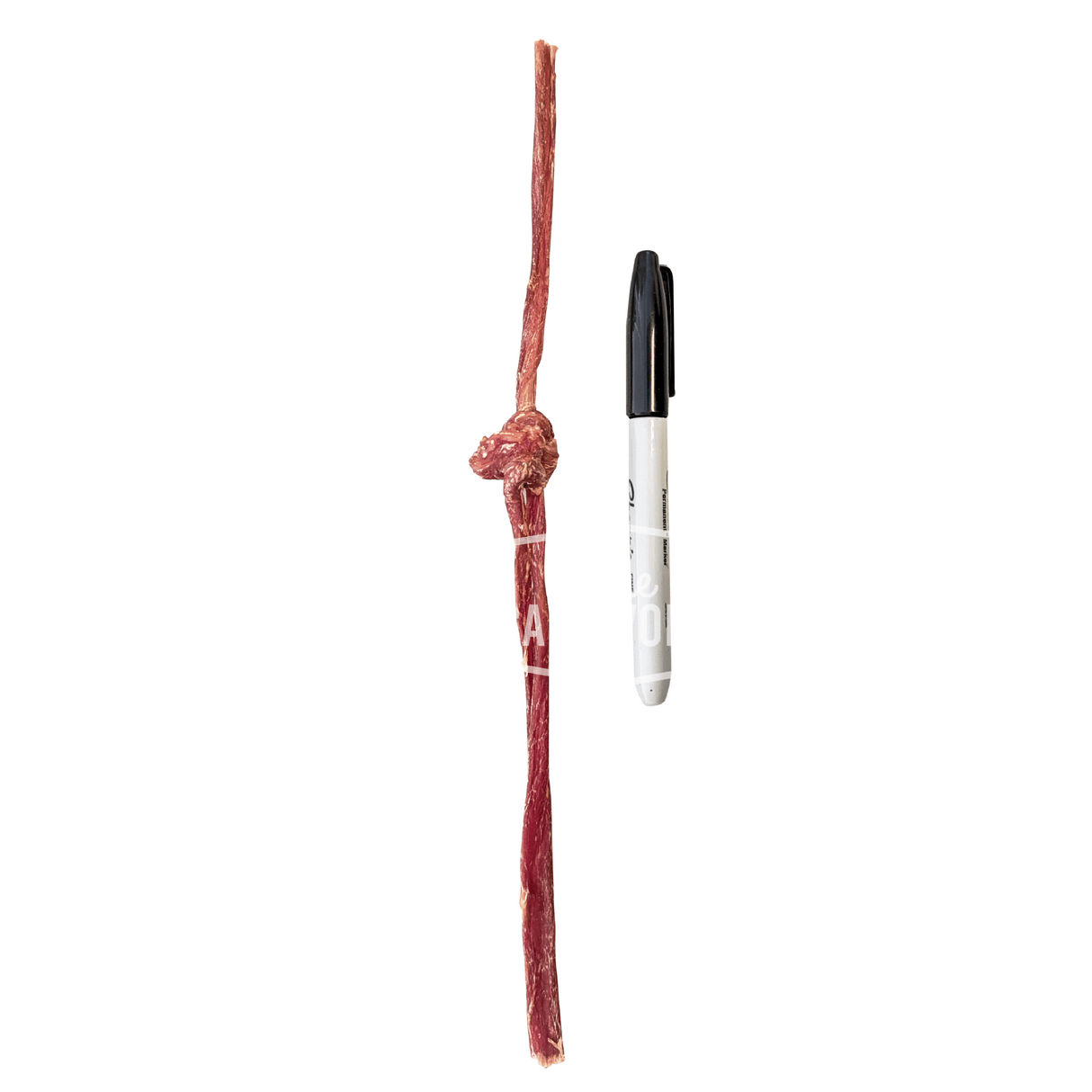 One Ingredient Pork Jerky Stick 10 Pack: A knotted pork jerky stick beside a marker for scale, showcasing its soft, thin, chewable texture for dogs.