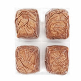 Red Dog Blue Kat Salmon and Tripe for Dogs: Four vacuum-sealed ground meat blocks on a tray, offering omega-3-rich, digestion-friendly raw meal portions.