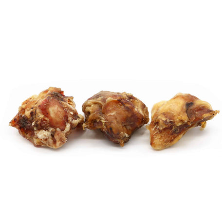 One Ingredient Dehydrated Beef Kneecap: Three bone chunks with meat and cartilage, ideal for dog chews, promoting dental health and offering a flavorful, long-lasting treat.