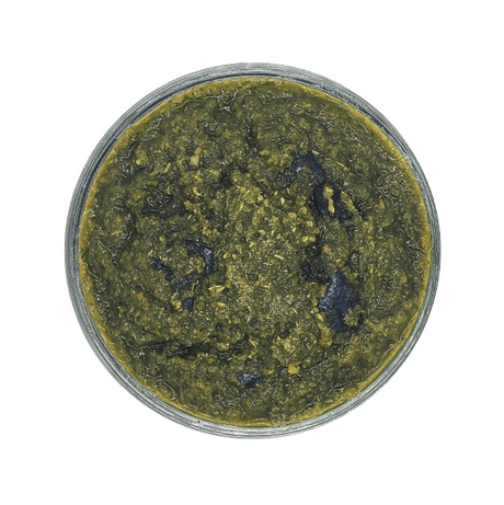 Bulk Veggie Bites - Frozen Raw Add-On in a glass ramekin, resembling a green herb-based paste for enhancing pet meals with fiber and antioxidants.