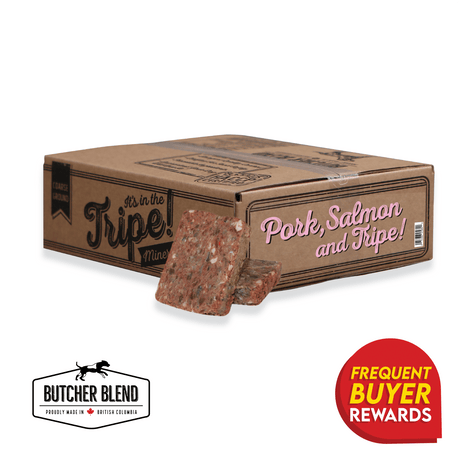 Butcher Blend Pork, Salmon & Tripe for Dogs: Raw patties with pork, salmon, tripe in coarse-ground texture. Box features Butcher Blend logo and rewards badge.