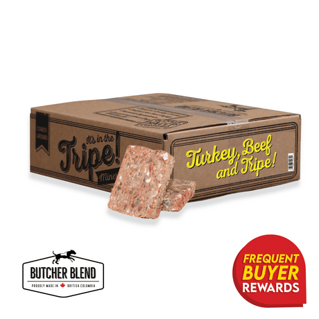 Butcher Blend Turkey, Beef with Tripe for Dogs; cardboard box with two raw meat patties, showcasing nutritional blend and reward badge.