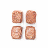 Red Dog Blue Kat Beef for Cats features four vacuum-sealed square beef patties, offering single-protein raw nutrition with beef meat, organs, and bone.
