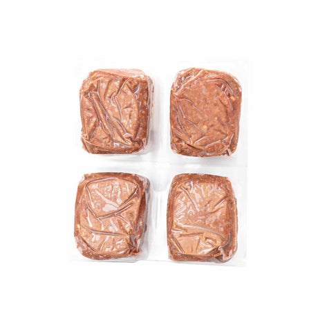 Red Dog Blue Kat Beef for Cats features four vacuum-sealed square beef patties, offering single-protein raw nutrition with beef meat, organs, and bone.