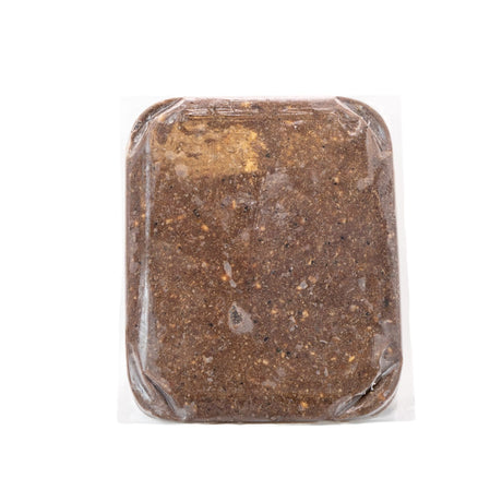 RDBK Everyday Raw Reef N' Beef: Vacuum-sealed block of raw beef and fish blend with veggies and blueberries, designed for easy thawing and nutrient-rich pet meals.