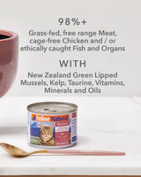 Feline Natural Canned Food for Cats: A can of New Zealand Chicken & Venison Feast, highlighting 99% Chicken, Venison & Organs, grain-free, with a gold-and-blush‐pink spoon beside it.