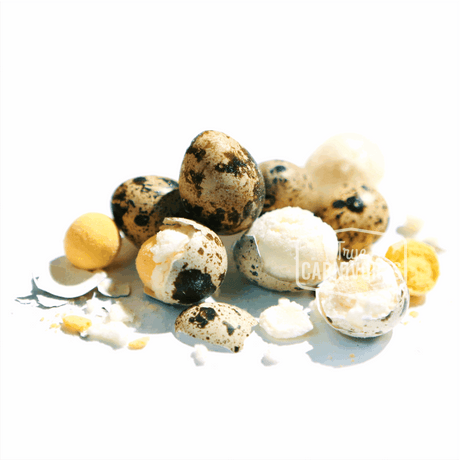 Freeze-Dried Quail Eggs 18 pack, displaying a pile of small speckled eggs, some cracked open, highlighting their dry, crumbly white and yellow interiors.