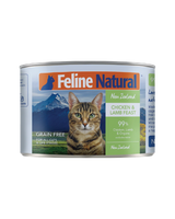 Feline Natural Canned Food for Cats: New Zealand Chicken & Lamb Feast, 99% meat, with a tabby cat in front of a mountain landscape on the label.