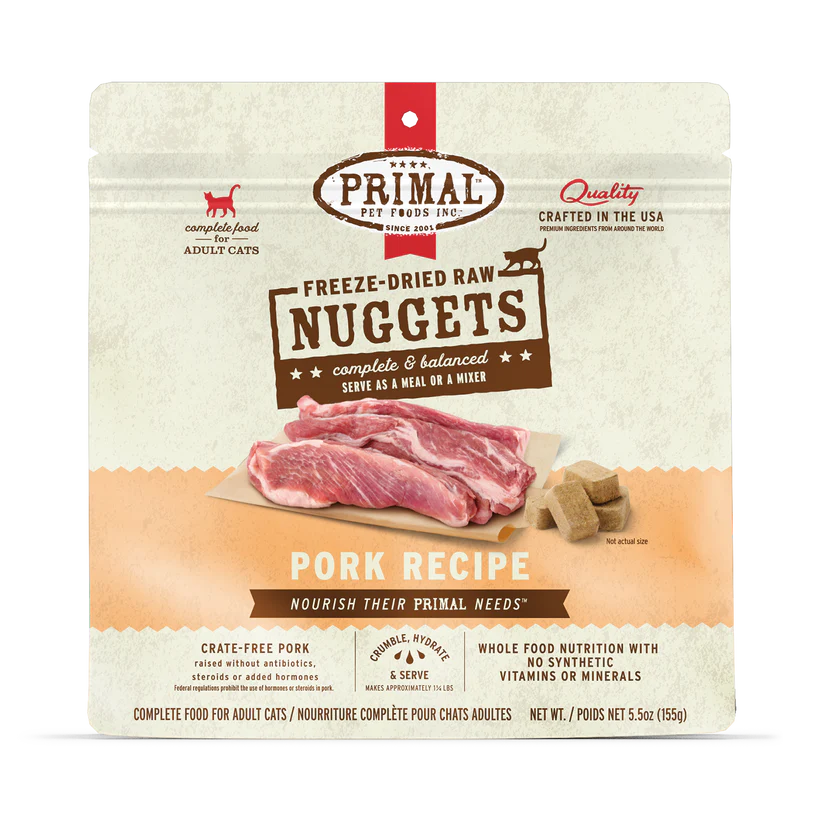 Primal Freeze Dried Pork for Cats package, highlighting crate-free pork, organic ingredients, freeze-dried nuggets, complete nutrition, and serving options as meal or mixer.