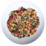 Tom & Sawyer Rosemary Venison bowl featuring lean venison, cooked grains, sweet potato, kale, and dried cranberries, offering a wholesome, balanced meal for pets.