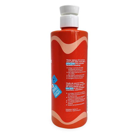 Thrive Salmon Oil bottle with pump, labeled for pet health benefits: skin, coat, joints, heart, and brain support. Made from pure salmon oil.