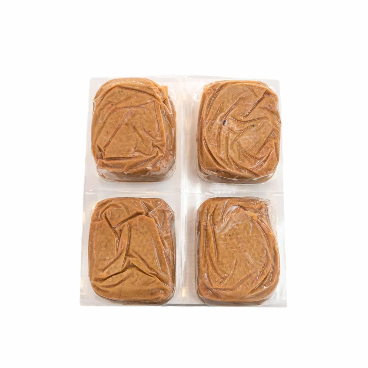 Red Dog Blue Kat Turkey for Cats in vacuum-sealed blister pack; four brown paste blocks, easy to portion raw nutrition for cats.