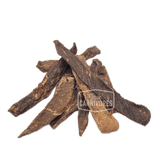 Pile of True Carnivores One Ingredient Dehydrated Beef Brisket jerky, freeze-dried strips ideal for pet training or as nutritious treats.