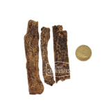 One Ingredient Dehydrated Beef Brisket chews beside a loonie for scale; thin, nutrient-rich pet treats from True Carnivores, ideal for training or rewarding.