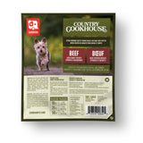 Caravan Country Cookhouse Beef dog food pouch with terrier image, flavor description, feeding guide, and bilingual ingredient list, complete for all life stages.