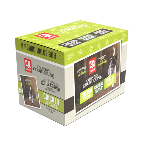 Caravan Country Cookhouse Chicken dog food package, 6-pound box with six meals, featuring chicken, spinach, blueberries; labeled human-grade, no fillers, complete & balanced.