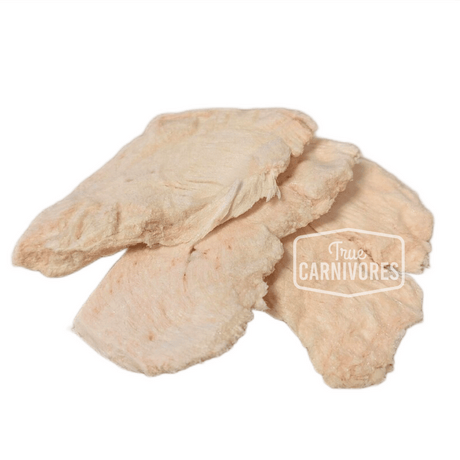 Cryogenically Freeze-Dried Chicken Breast Cutlets 60g, thin, pale slabs ideal for cat training or as a food topper, in a resealable bag.