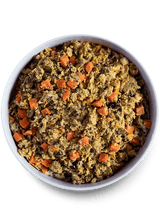 Open Farm Gently Cooked Homestead Turkey Recipe in a white bowl, featuring shredded turkey with diced carrots, resembling moist dog food for adult dogs.