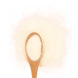 Pork Skin Collagen 454g shown as a fine white crystalline powder on a wooden spoon, supporting pet joint, skin, and digestive health.