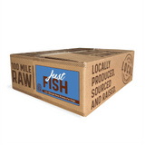100 Mile Raw Just Fish dog food box with Locally Produced, Sourced and Raised branding, 20 lb weight, highlighting low-allergen, Omega-3 rich fish blend.