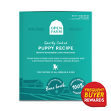 Open Farm Gently Cooked Puppy Recipe packaging showcasing chicken, salmon, and pork meal in bone broth. Features human-grade ingredients for puppies, with a rewards badge.