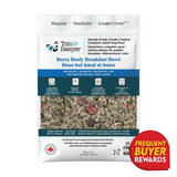 Tom & Sawyer Goji Berry Beef dog meal label highlights beef with goji berries, fruits, veggies, antibiotic-free meat, non-GMO ingredients, and a Frequent Buyer Rewards badge.