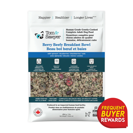 Tom & Sawyer Goji Berry Beef dog meal label highlights beef with goji berries, fruits, veggies, antibiotic-free meat, non-GMO ingredients, and a Frequent Buyer Rewards badge.
