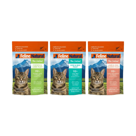 Feline Natural Pouches - Variety Box includes three flavors: Chicken & Lamb, Hoki & Beef, Lamb & King Salmon. Labeled complete & balanced, grain-free, ideal for hydration.