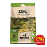 ZEAL Air-Dried Chicken for Dogs pouch with pastoral farm scene, emphasizing 96% pure meat & organs, grain-free, made in Canada, and Frequent Buyer Rewards badge.