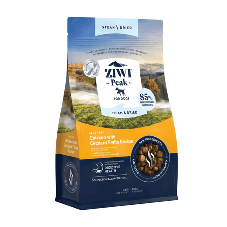 ZIWI Peak Steam-Dried Chicken with Orchard Fruits dog food bag shows bite-sized nuggets through a window, highlighting premium, ethically sourced ingredients and air-dried kibble.